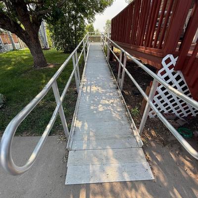 Aluminum Wheelchair ramp with a landing 38in wide 36 1/2 feet long then 8ft long then 20ft