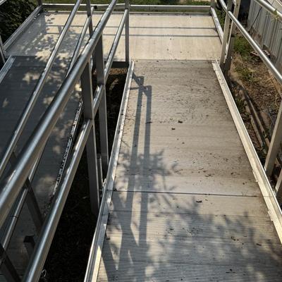 Aluminum Wheelchair ramp with a landing 38in wide 36 1/2 feet long then 8ft long then 20ft