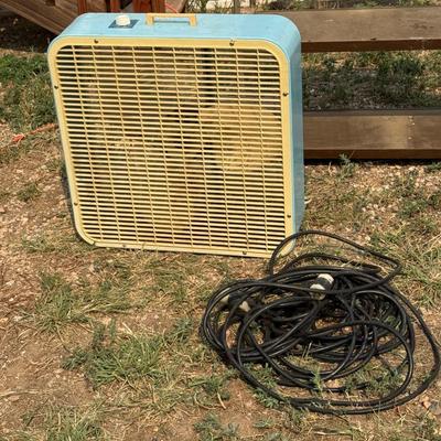 Two extension cords, small metal shelf and box fan