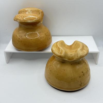LOT 13K: Vintage Pottery Insulators - one marked Thomas