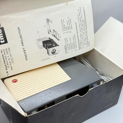 LOT 20L: Vintage TMC Pocket Projectors w/ Boxes & Magazine Airequipt Slide Changer