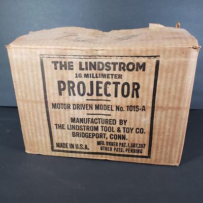 LOT 92L: Lindstrom 16mm Projector with Mutt & Jeff, Charlie Chaplin, Ken Maynard Reels