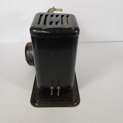 LOT 92L: Lindstrom 16mm Projector with Mutt & Jeff, Charlie Chaplin, Ken Maynard Reels