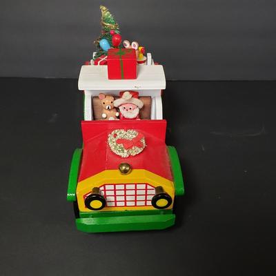 LOT 95P: Vintage Musical Wooden Christmas Trains with Mini Nutcrackers