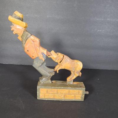 LOT 99L: Disney Fisher Price Pluto Pop Up, Monkey Jester Flip Toy, and Hand Carved Movable Wooden Toys