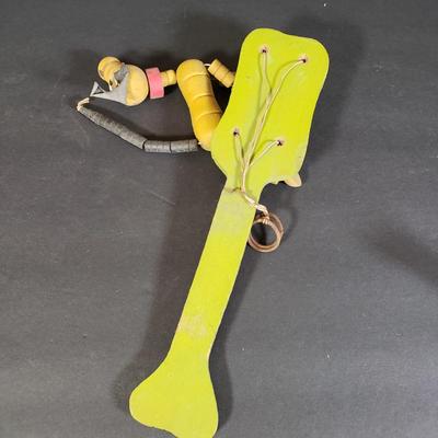 LOT 99L: Disney Fisher Price Pluto Pop Up, Monkey Jester Flip Toy, and Hand Carved Movable Wooden Toys
