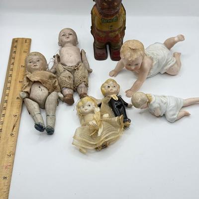 LOT 119K: Vintage Wind Up Tin Litho Toy & Ceramic Babies