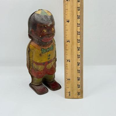 LOT 119K: Vintage Wind Up Tin Litho Toy & Ceramic Babies