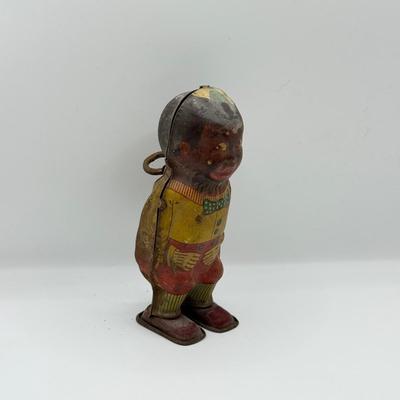 LOT 119K: Vintage Wind Up Tin Litho Toy & Ceramic Babies