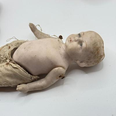 LOT 119K: Vintage Wind Up Tin Litho Toy & Ceramic Babies