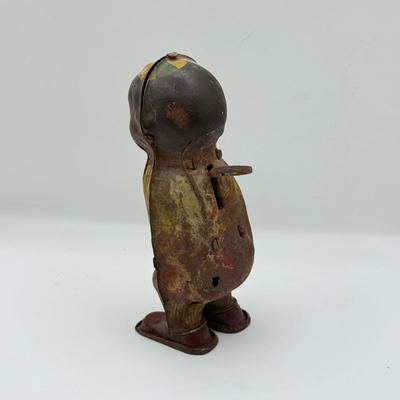 LOT 119K: Vintage Wind Up Tin Litho Toy & Ceramic Babies