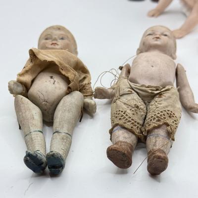 LOT 119K: Vintage Wind Up Tin Litho Toy & Ceramic Babies