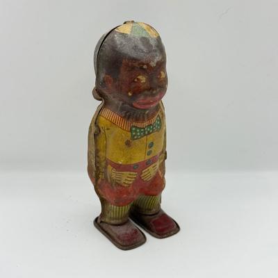 LOT 119K: Vintage Wind Up Tin Litho Toy & Ceramic Babies