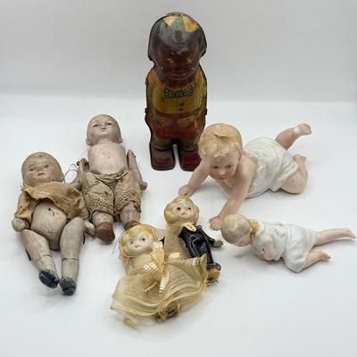 LOT 119K: Vintage Wind Up Tin Litho Toy & Ceramic Babies