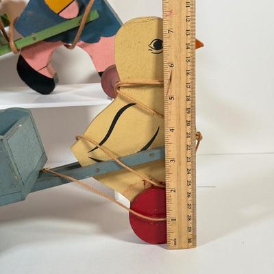LOT 123L: Vintage Wooden Pull Toys w/ Wagons - one stamped "Toddler Toys"