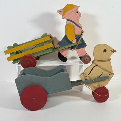 LOT 123L: Vintage Wooden Pull Toys w/ Wagons - one stamped "Toddler Toys"