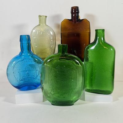LOT 127L: Clevenger Brothers Bottles: Jersey Devil, Nathan Hale, E C Booz Old Cabin Whiskey & More