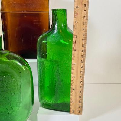 LOT 127L: Clevenger Brothers Bottles: Jersey Devil, Nathan Hale, E C Booz Old Cabin Whiskey & More