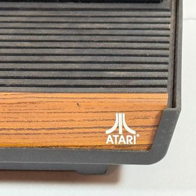LOT 137L: Vintage 1980s Atari Video Computer System Model CX-2600 w/ Manual, 2 Joysticks, 2 Paddles, Power Cord & 4 Games w/...