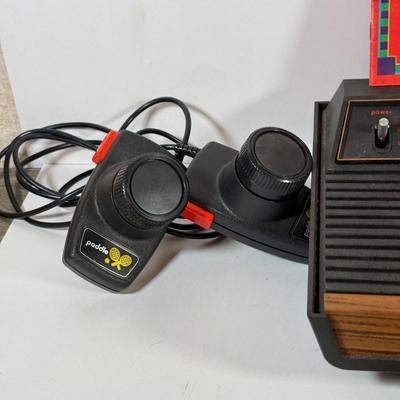 LOT 137L: Vintage 1980s Atari Video Computer System Model CX-2600 w/ Manual, 2 Joysticks, 2 Paddles, Power Cord & 4 Games w/...