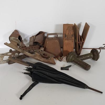 LOT 142L: Noisemakers, Musical Jump Rope Handles, Klitter Klatters, Antique Ice Skates & More