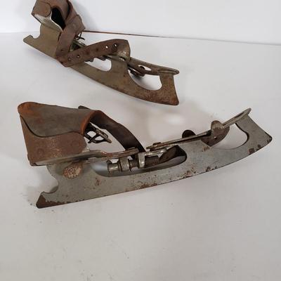 LOT 142L: Noisemakers, Musical Jump Rope Handles, Klitter Klatters, Antique Ice Skates & More