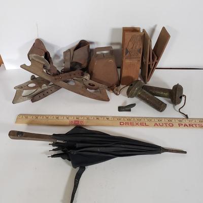 LOT 142L: Noisemakers, Musical Jump Rope Handles, Klitter Klatters, Antique Ice Skates & More