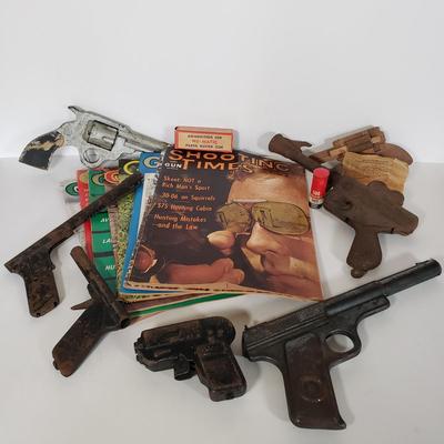 LOT 150L: Vintage Toy Guns & Accessories with 1960s Gun Sport Magazines