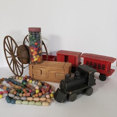 LOT 151L: Wooden Toy Collection; Tinker Beads, Trains, Puzzle Block & More