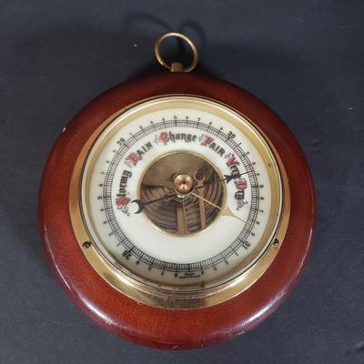 LOT 152P: Antique Metal Ships Wheel with Barometers and Weather Radio