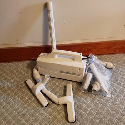 LOT 154A: Vintage Oreck XL Handheld Vacuum with Attachments