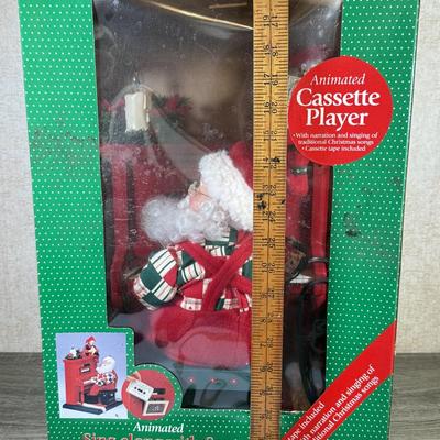 LOT 164L: NIB Animated Sing-along w/ Santa Cassette Player