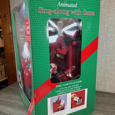 LOT 164L: NIB Animated Sing-along w/ Santa Cassette Player