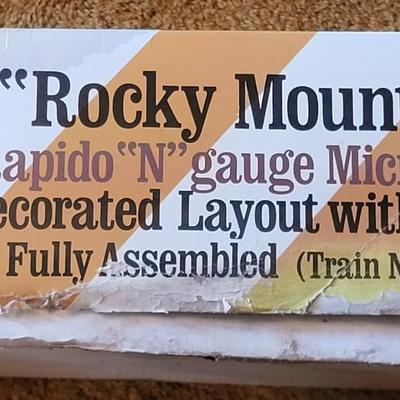LOT 183L: Vintage Revell Fully Assembled N-Gauge MicroTrain 'Rocky Mountain' Decorated Layout Toy in Orignal Box