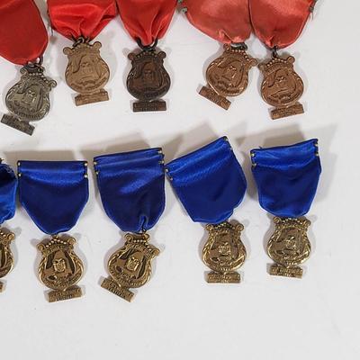 LOT 194L: Multiple School Music Association Solo-Ensemble Festival Medals Made in New York by Dieges & Clust