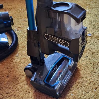 LOT 197X: Pair of Vaccums by ION and Oreck with Additional Parts