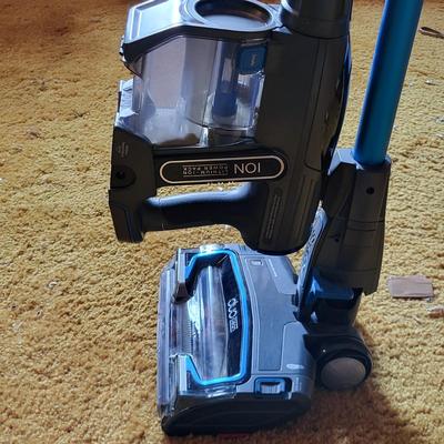 LOT 197X: Pair of Vaccums by ION and Oreck with Additional Parts