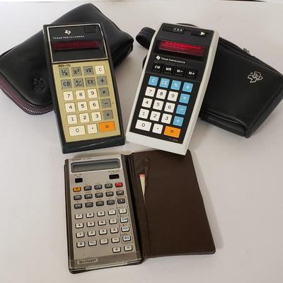 LOT 211L: Vintage Calculators; Sharp Elsi Mate & Texas Instruments