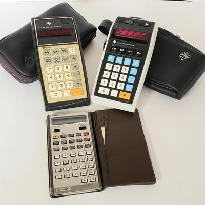 LOT 211L: Vintage Calculators; Sharp Elsi Mate & Texas Instruments