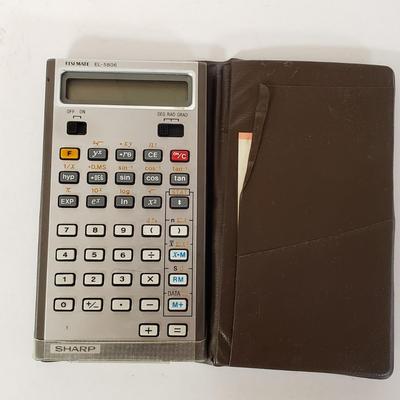 LOT 211L: Vintage Calculators; Sharp Elsi Mate & Texas Instruments