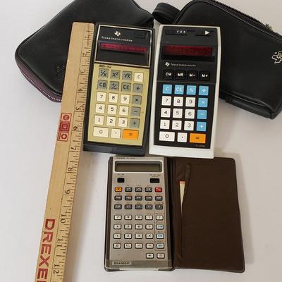 LOT 211L: Vintage Calculators; Sharp Elsi Mate & Texas Instruments