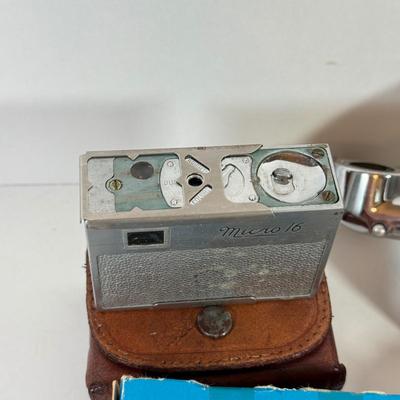 LOT 221L: Vintage Polaroid Pronto Land Camera w/ Flash Bars & More