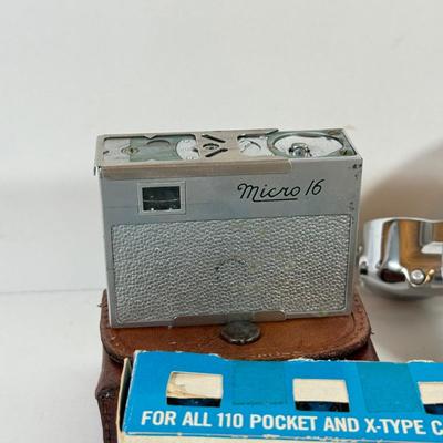 LOT 221L: Vintage Polaroid Pronto Land Camera w/ Flash Bars & More