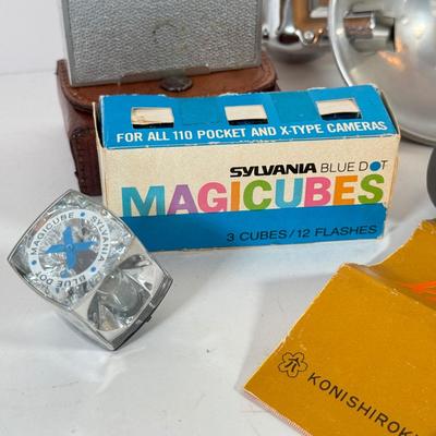 LOT 221L: Vintage Polaroid Pronto Land Camera w/ Flash Bars & More