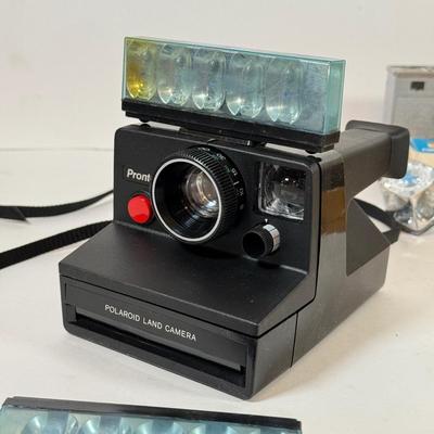 LOT 221L: Vintage Polaroid Pronto Land Camera w/ Flash Bars & More