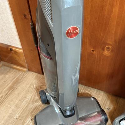 LOT 224K: Kenmore Stratus 24V Slim Cordless Vacuum & Hoover Evolve Pet Cordless Vacuum w/ Tag