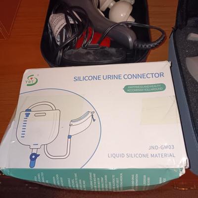 esteem vacuum therapy system and Silicone urine conductor plus a massager