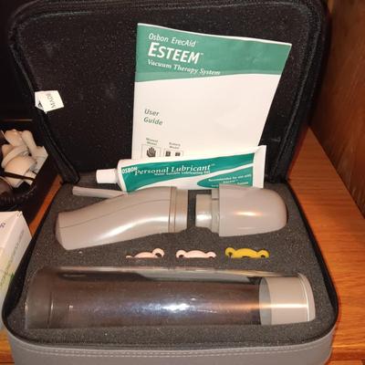 esteem vacuum therapy system and Silicone urine conductor plus a massager