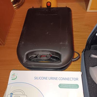 esteem vacuum therapy system and Silicone urine conductor plus a massager