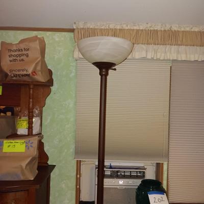 Floor lamp with glass globe